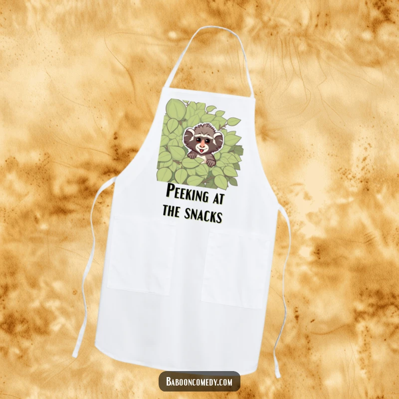 Funny apron with a cheeky baboon peeking from behind a leafy bush, ideal for adding primate-themed playful humor to kitchen activities.