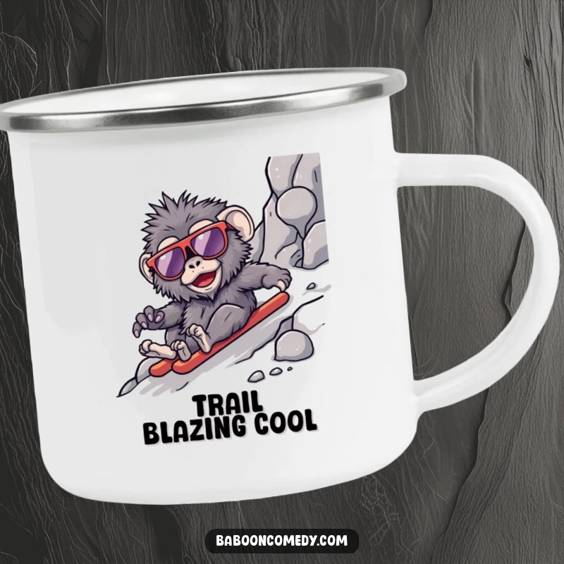 Funny kawaii baboon camping mug, a primate in sunglasses sliding down a rocky terrain, perfect for rugged, adventurous sips.