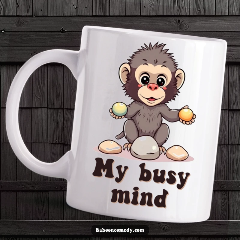 Funny kawaii baboon mug graphic of a primate trying to juggle three shiny pebbles, looking focused yet precarious.