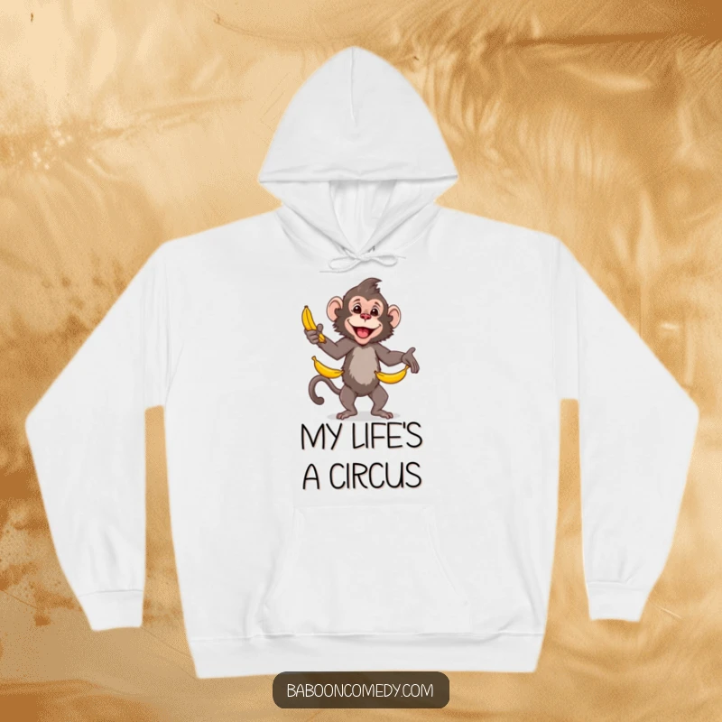 Funny baboon hoodie, a skillful primate juggling multiple bananas with ease and a happy expression, designed for cozy laughs.