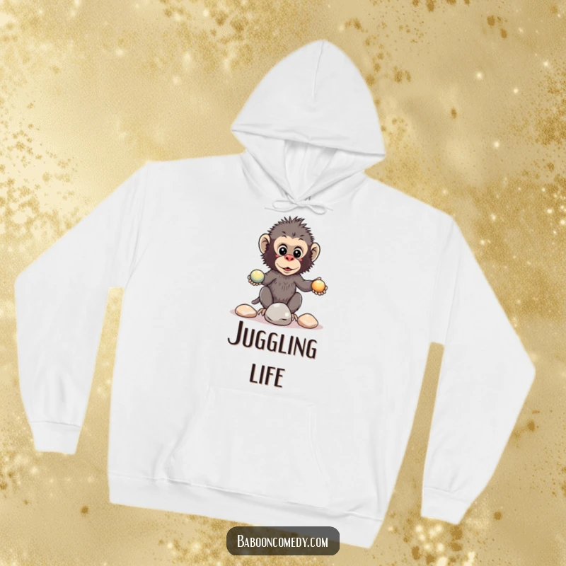 Funny kawaii baboon hoodie graphic of a primate attempting to juggle three shiny pebbles with concentration.