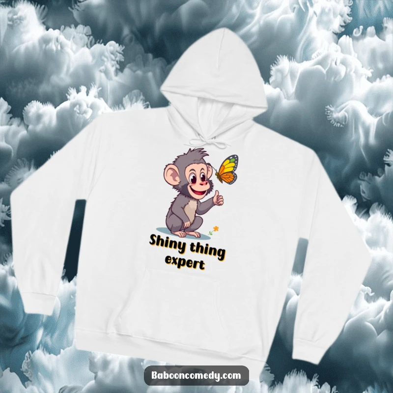 Funny hoodie depicting a curious baboon pointing with great excitement at a colorful butterfly, designed for comfort and a sense of wonder.