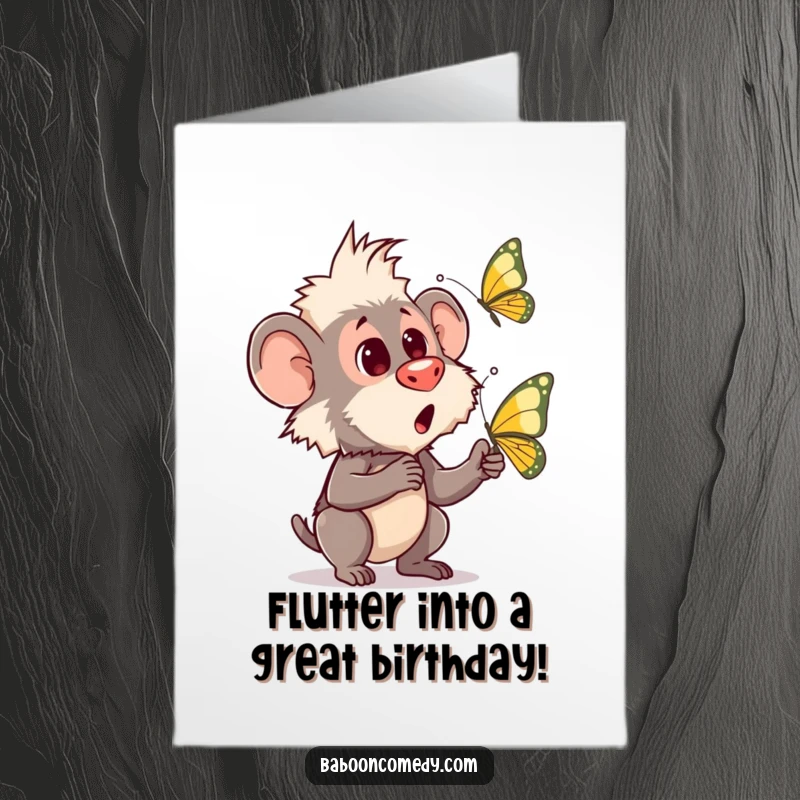 Funny Free Printable Birthday Card: A baboon looks astonished as a colorful butterfly flutters unexpectedly near its face.