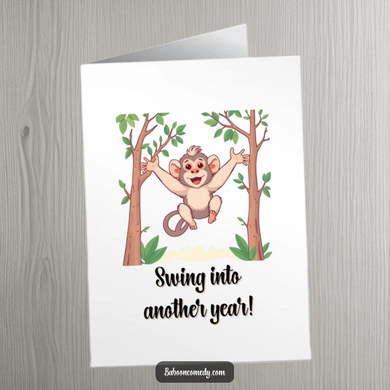 Funny Free Printable Birthday Card: Kawaii baboon with long arms playfully swinging through jungle trees.