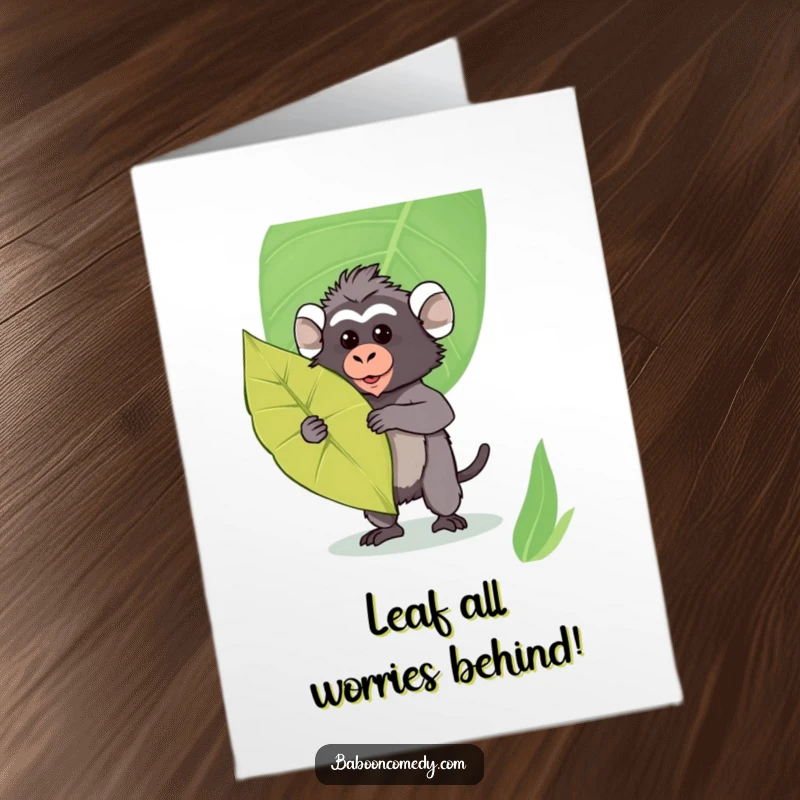 Funny Free Printable Birthday Card: Kawaii baboon holding a large leaf like a shield, striking a playful pose.
