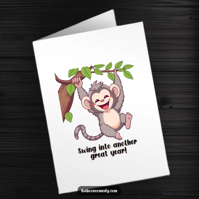 Funny Free Printable Birthday Card: Kawaii baboon swinging joyfully on a vine with a massive grin.
