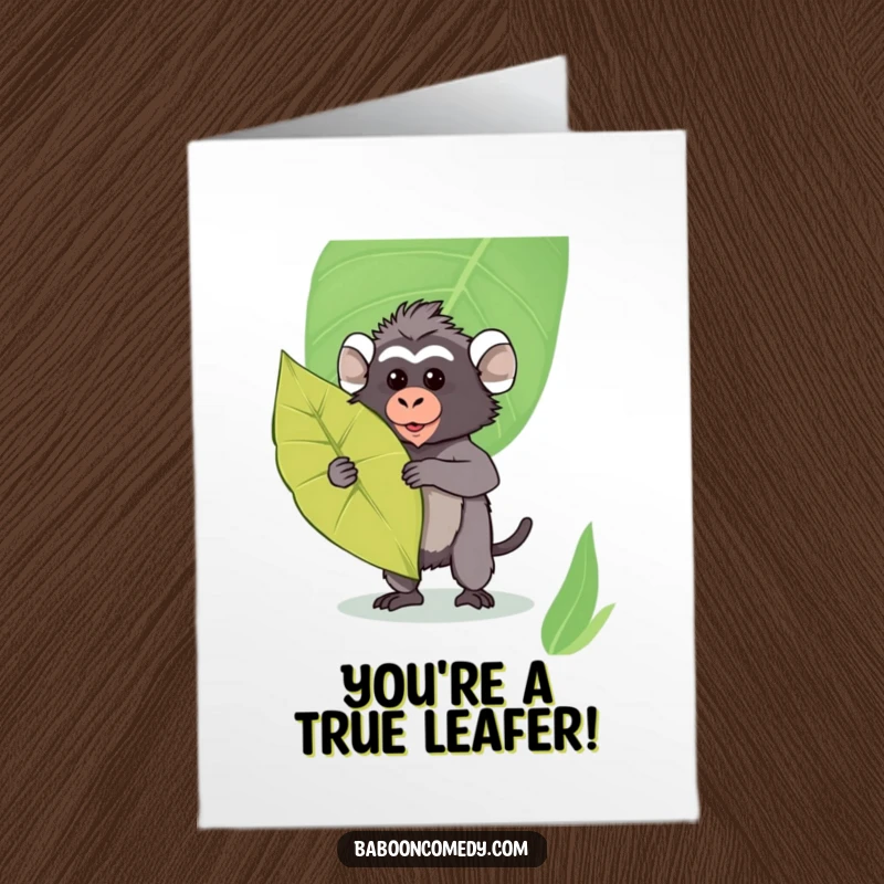 Funny Free Printable Congrats Card: Kawaii baboon posing bravely with a large leaf as a shield.