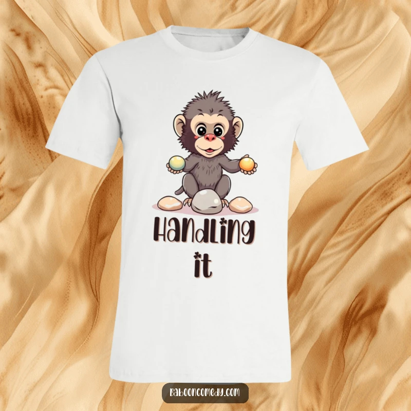 Funny kawaii baboon t-shirt image of a primate focused on juggling three shiny pebbles, with a determined expression.